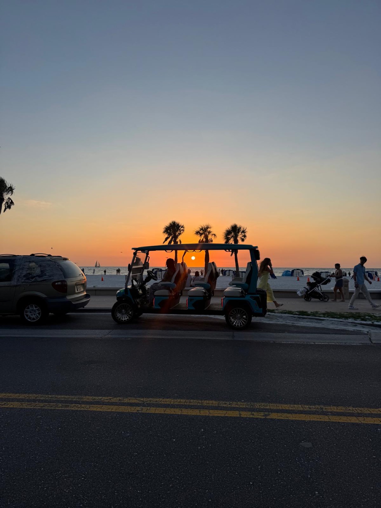 Golf cart at Clearwater Beach sunset